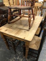 A SMALL PINE KITCHEN TABLE.