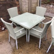 A SQUARE LLOYD LOOM PATION TABLE AND 4 MATCHING CHAIRS