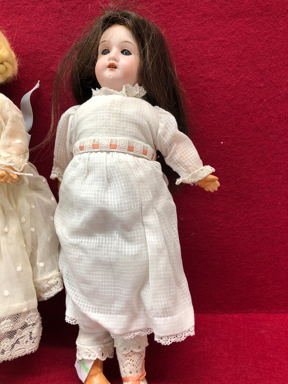 A GERMAN BISQUE HEADED DOLL WITH FIXED EYES AND OPEN MOUTH. H 29cms. TOGETHER WITH ANOTHER BISQUE - Image 3 of 4