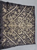 A BLACK SILK PANEL EMBROIDERED IN GOLD THREAD AND SEQUINS, POSSIBLY OTTOMAN, SEWN WITH CHEVRON BANDS
