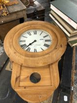 A PINE WALL CLOCK