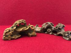 TWO CHINESE CARVINGS OF PINE TREES, ONE IN HARDWOOD AND THE OTHER IN BAMBOO, THE LARGER. W 20cms.