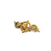 A VINTAGE SCROLL, FOLIATE AND NUGGET BROOCH. THE BROOCH UNHALLMARKED, VARIOUSLY ASSESSED AS AN 16-