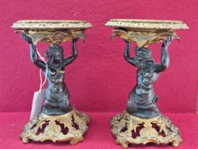 PAIR OF 19th C. BRONZE AND ORMOLU STANDS SUPPORTING SLATE BLACK CERAMIC BOWLS, THE ORMOLU TOPS