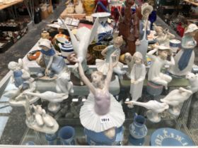 A LARGE COLLECTION OF LLADRO AND NAO FIGURINES