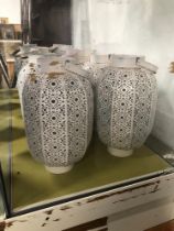 A SET OF TWELVE WHITE PAINTED PIERCED METAL CANDLE LANTERNS