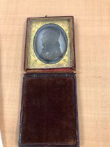 A LEATHER CASED DAGUERROTYPE PHOTOGRAPH OF A GENTLEMAN