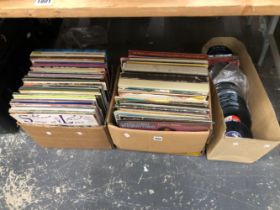 A LARGE COLLECTION OF RECORD ALBUMS AND SINGLES