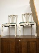 A PAIR OF FRENCH CREAM PAINTED BOUDOIR CHAIRS WITH BLUE DAMASK VELVET DROP IN SEATS ABOVE CABRIOLE