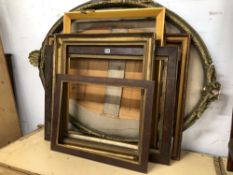 A GILT GESSO OVAL FRAME TOGETHER WITH SIX RECTANGULAR FRAMES