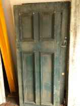 A LARGE PAIR OF ANTIQUE PANEL DOORS