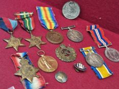 MEDALS. A PAIR OF WWI MEDALS TO PTE. 44745 T.N.DAVIES, WELSH REGT.,A TRIO OF WWI MEDALS TO SPR.