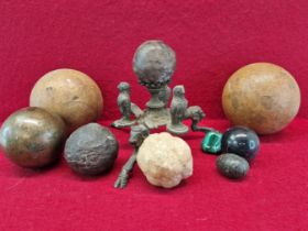 TWO IRON CANNON BALLS, A BRONZE BALL. TWO WOODEN BALLS, A BRONZE TRIPOD STAND, A MALACHITE AND THREE