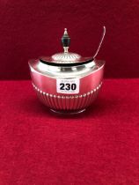 A SILVER SUGAR BOX BY WILLIAM HUTTON AND SONS, SHEFFIELD 1910, THE OVAL SECTIONED BASE WITH