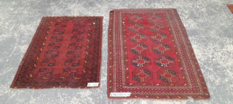 TWO AFGHAN BOKHARA RUGS. LARGEST 164 x 102cms (2)
