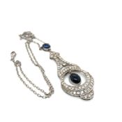 AN ANTIQUE SAPPHIRE AND DIAMOND ARTICULATED PENDANT. THE PENDENT DROP APPROX 6.6cms. UNHALLMARKED,