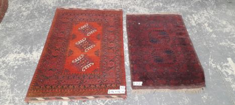 TWO AFGHAN BOKHARA RUGS. LARGEST 154 x 104cms (2)
