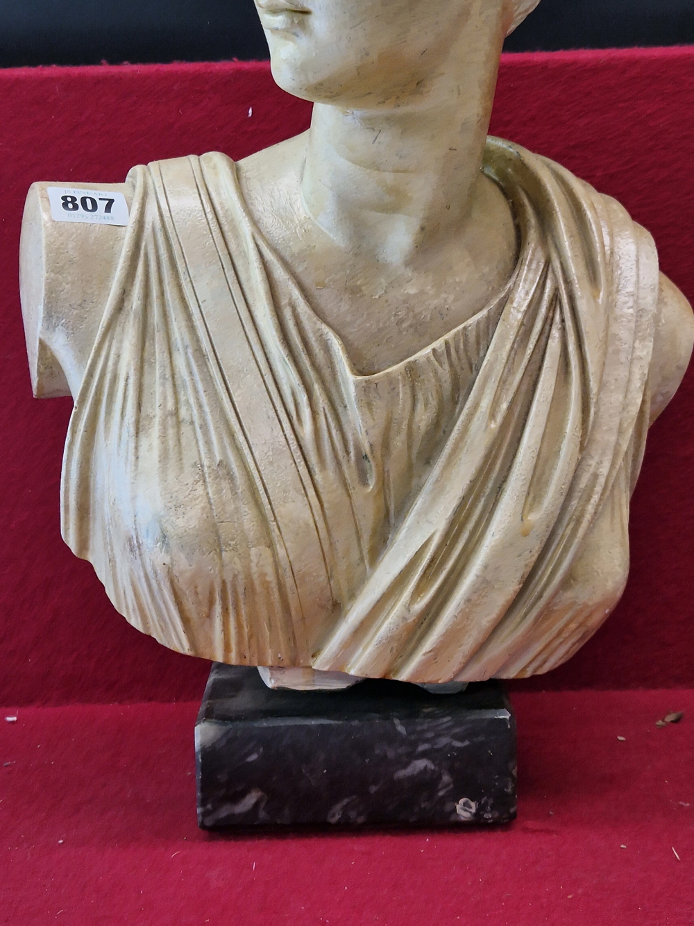 A PLASTER CLASSICAL BUST OF A LADY FACING OVER HER RIGHT SHOULDER AND SUPPORTED ON A MOTTLED BLACK - Image 4 of 6