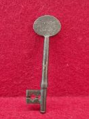 AN INTERESTING 19th CENTURY IRON KEY, WITH ENGRAVED INSCRIPTION "ST. LUCIA OFFICERS BILLIARD RM. "