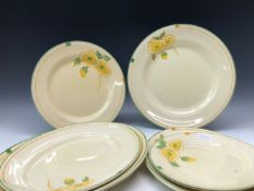 THREE CLARICE CLIFF HONEYGLAZE PLATTERS EN SUITE WITH FOUR PLATES, EACH WITH TWO YELLOW FLOWERS