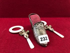 A SILVER LADYS FLORAL SHOE PIN CUSHION, EARLY 20th C. IMPORT MARKS, TWO TEETHING RINGS WITH