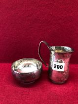 A SILVER CREAM JUG AND BOWL DESIGNED BY ANTHONY HAWKESLY FOR PAYNE & CO, OXFORD, LONDON 1970, EACH