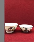 TWO CHINESE WUCAI BOWLS, THE EXTERIORS WITH BUTTERFLY AND FLOWER ROUNDELS ON ONE. Dia. 15cms. AND