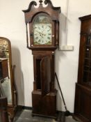A 19th C. MAHOGANY LONG CASED CLOCK BY JOHN FLETCHER WITH COTTAGES PAINTED IN THE ARCH OF THE