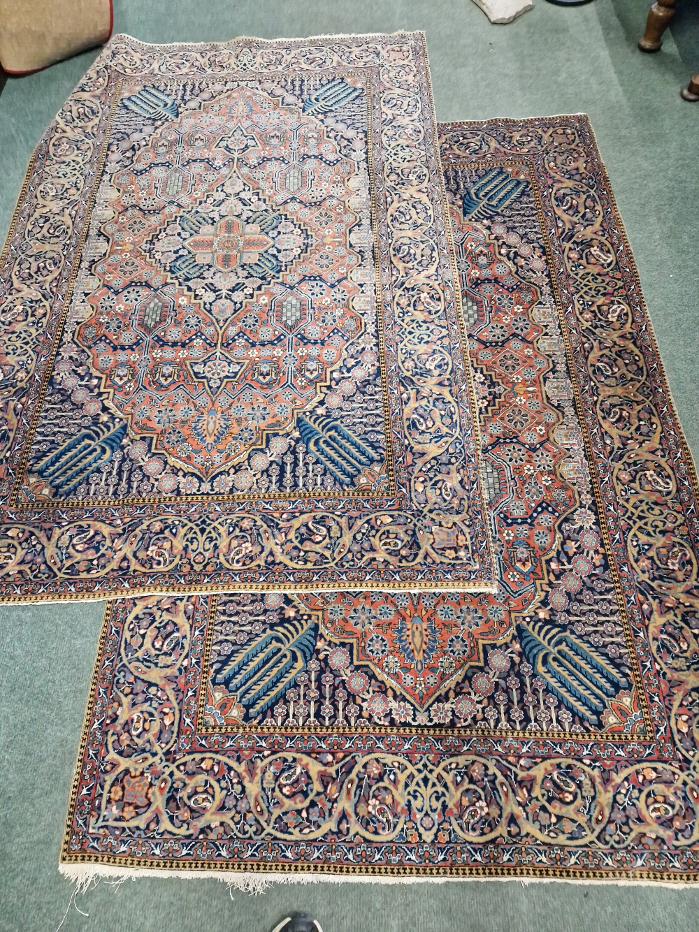 A PAIR OF ANTIQUE PERSIAN KASHAN RUGS. 298 x 132cms