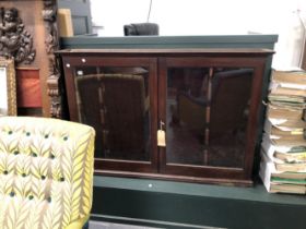 A ANTIQUE MAHOGANY WALL HANGING GUN DISPLAY CABINET