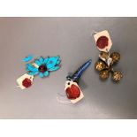 AN EASTERN ENAMEL FINGER TIP FINGER NAIL RING, A SET OF FIVE METAL BEADS, AND A LOTUS APPLIQUE.