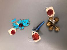 AN EASTERN ENAMEL FINGER TIP FINGER NAIL RING, A SET OF FIVE METAL BEADS, AND A LOTUS APPLIQUE.
