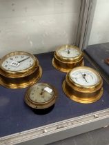 THREE BRASS CASED SHIPS CLOCKS TOGETHER WITH AN ANEROID BAROMETER SIMILARLY CASED
