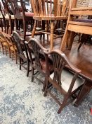 A SET OF EIGHT CARVED MAHOGANY GEORGIAN STYLE DINING CHAIRS (INCLUDES TWO ARMCHAIRS)