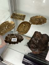 FOUR BRASS ASHTRAYS CAST WITH FIGURES, ANOTHER IN BRONZE AND A SIXTH IN IRON