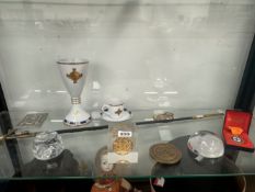 A DRESSSWORD TOGETHER WITH MASONIC PAPERWEIGHTS, A PORCELAIN CHALICE, A COFFEE CUP AND SAUCER, ETC.