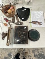 A BRASS LETTER RECIEVER, A NUTMEG GRATER, CROWN BOTTLE OPENERS, A TIN CASH BOX, TOGETHER WITH