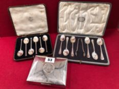 TWO HALLMARKED SILVER CASED SETS OF TEA SPOONS, AND A 925 STAMPED WOOD LINED CIGARETTE BOX.
