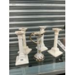 TWO PAIRS OF VIENNA CREAMWARE CANDLESTICKS TOGETHER WITH A QUIMPER CANDLESTICK