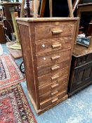 A VINTAGE PINE EIGHT DRAWER TALL CHEST
