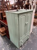 A PAINTED PINE CUPBOARD WITH TWO DRAWERS