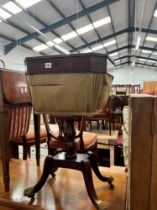 AN INLAID MAHOGANY REGENCY LIFT TOP WORK TABLE