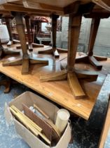 A PAIR OF OAK SQUARE TOP CAFE TABLES (2)