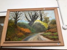 20TH CENTURY OIL ON BOARD OF A COUNTRY LANE.