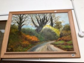 20TH CENTURY OIL ON BOARD OF A COUNTRY LANE.
