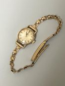 A LADIES OMEGA 9ct HALLMARKED GOLD WRIST WATCH. WINDS DOESN'T RUN. GROSS WEIGHT 13.90grms