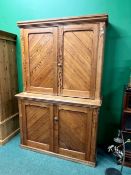 A LATE VICTORIAN PITCH PINE TWO PART CABINET STAMPED W.H.C. & W.H.S.B.
