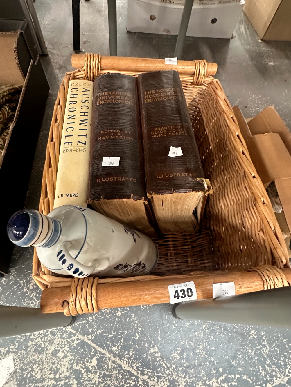 BOOKS: THE AUSCHWITZ CHRONICAL AND THE HOUSEHOLD ENCYCLOPEDIA TOGETHER WITH A DELFT BOTTLE IN A