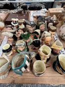 A COLLECTION OF 21 SYLVAC AND OTHER CHARACTER JUGS