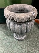 A PAIR OF CARVED GREEN MARBLE URNS.